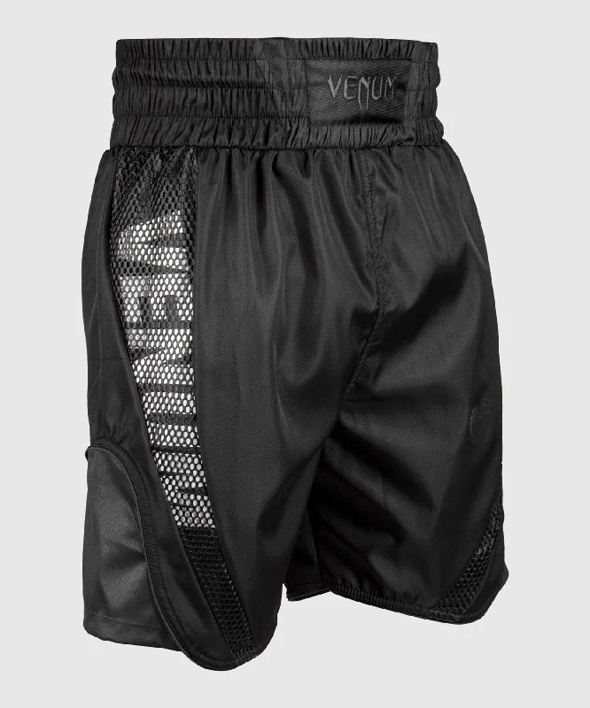 Men's pleated front twill shorts for a classic and sophisticated appearanceShort de boxe Venum Elite - Noir/Noir Men's pleated front twill shorts for a classic and sophisticated appearanceShort de boxe Venum Elite - Noir/Noir
