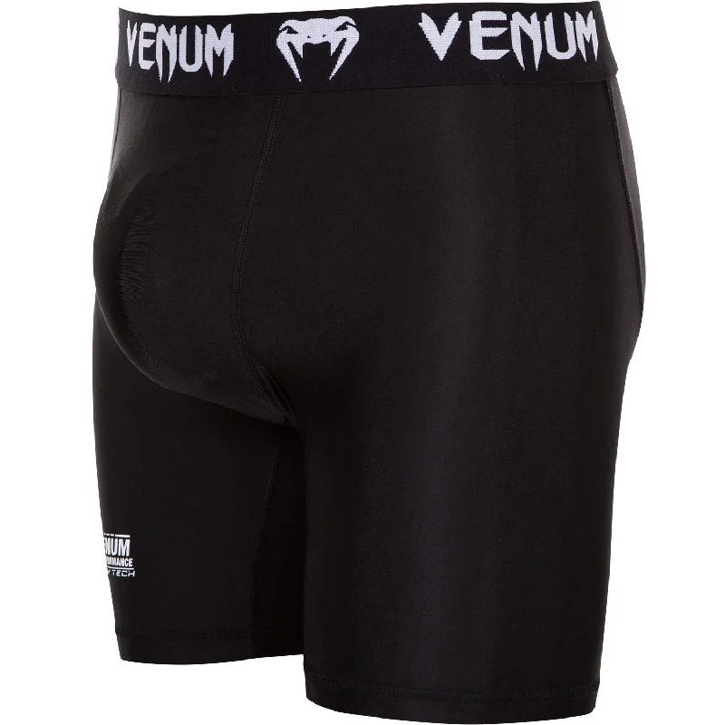 Men's zip - pocket canvas shorts for added functionality during travelShort de compression Venum Contender 2.0 - noir/blanc Men's zip - pocket canvas shorts for added functionality during travelShort de compression Venum Contender 2.0 - noir/blanc