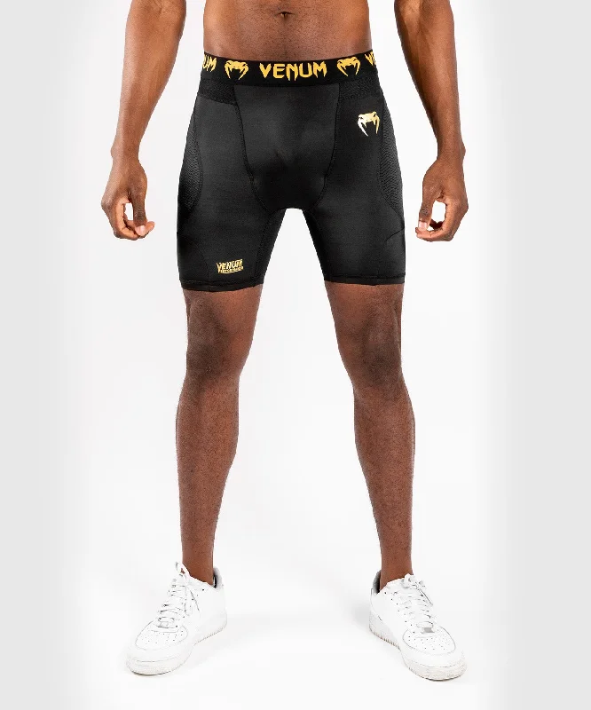 Men's pleated front twill shorts for a classic and sophisticated appearanceShort de compression Venum G-Fit Men's pleated front twill shorts for a classic and sophisticated appearanceShort de compression Venum G-Fit