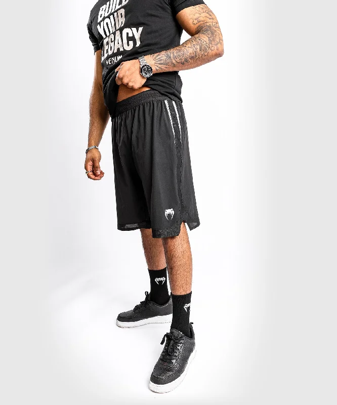 Men's adjustable - length convertible shorts for versatile useShort de Fitness Venum Tempest 2.0 - Noir/Gris Men's adjustable - length convertible shorts for versatile useShort de Fitness Venum Tempest 2.0 - Noir/Gris