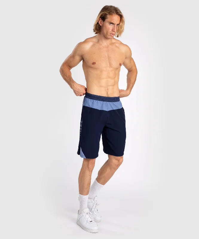 Men's side - stripe track shorts for a sporty running lookShort de training pour Hommes Venum Tempest - Bleu Marine/Bleu Men's side - stripe track shorts for a sporty running lookShort de training pour Hommes Venum Tempest - Bleu Marine/Bleu