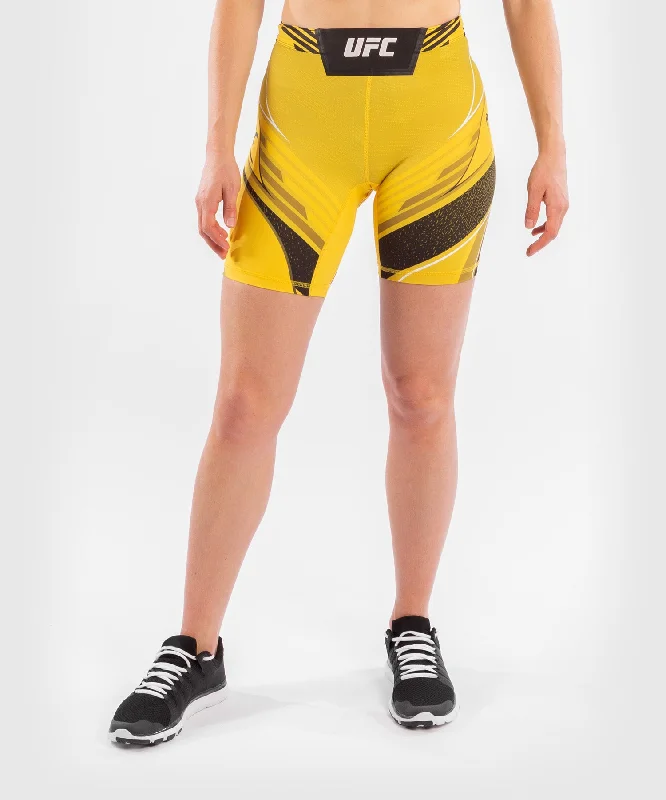 Men's side - stripe track shorts for a sporty running lookShort de Vale tudo Femme UFC Venum Authentic Fight Night - Coupe Longue - Jaune Men's side - stripe track shorts for a sporty running lookShort de Vale tudo Femme UFC Venum Authentic Fight Night - Coupe Longue - Jaune