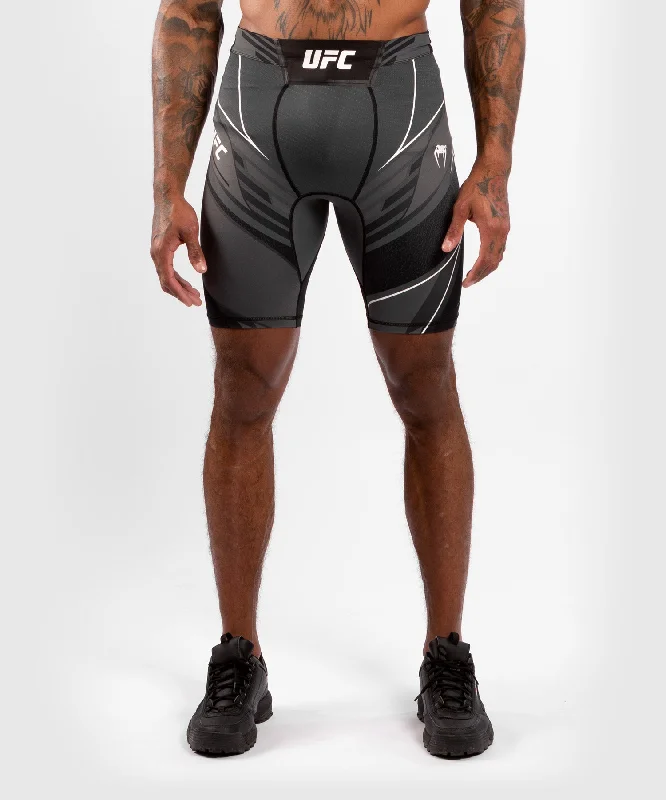 Men's distressed cotton shorts for a bohemian - inspired styleShort de Vale tudo Homme UFC Venum Authentic Fight Night - Coupe Longue - Noir Men's distressed cotton shorts for a bohemian - inspired styleShort de Vale tudo Homme UFC Venum Authentic Fight Night - Coupe Longue - Noir