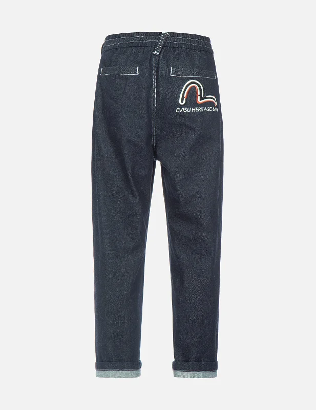 Men's Slim Fit Stretch Jeans in Dark Wash for a Modern and Comfortable LookColorblock Seagull Embroidered Tapered-fit Jeans Men's Slim Fit Stretch Jeans in Dark Wash for a Modern and Comfortable LookColorblock Seagull Embroidered Tapered-fit Jeans