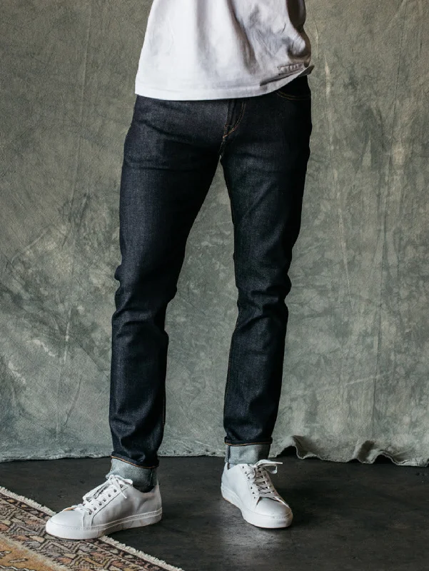 Men's Jeans with an Elastic Waistband for Ultimate ComfortThe Scissors Slim Tapered Jean - Indigo Raw Men's Jeans with an Elastic Waistband for Ultimate ComfortThe Scissors Slim Tapered Jean - Indigo Raw