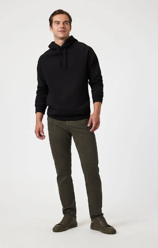 Men's Stretch Jeans with a Moisture - Wicking Lining for Active LifestylesJAKE SLIM LEG IN MILITARY ATHLETIC Men's Stretch Jeans with a Moisture - Wicking Lining for Active LifestylesJAKE SLIM LEG IN MILITARY ATHLETIC