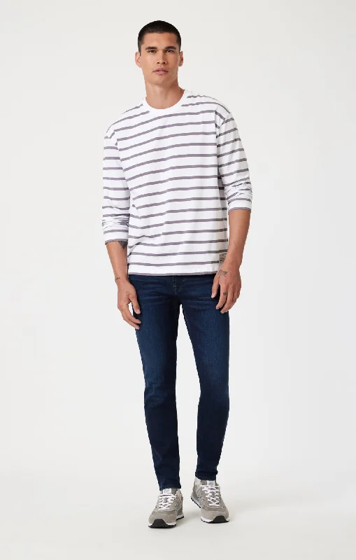 Men's Stretch Jeans with a Moisture - Wicking Lining for Active LifestylesJAMES SKINNY DEEP INDIGO SUPERMOVE Men's Stretch Jeans with a Moisture - Wicking Lining for Active LifestylesJAMES SKINNY DEEP INDIGO SUPERMOVE