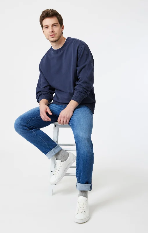 Men's Low - Rise Jeans in a Light Wash for a Casual and Youthful LookSTEVE ATHLETIC FIT IN DARK BRUSHED SUPERMOVE Men's Low - Rise Jeans in a Light Wash for a Casual and Youthful LookSTEVE ATHLETIC FIT IN DARK BRUSHED SUPERMOVE
